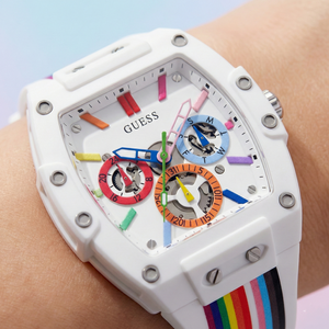 Detailed close-up of the rainbow skeleton dial and colorful hands of Guess GW0720G1