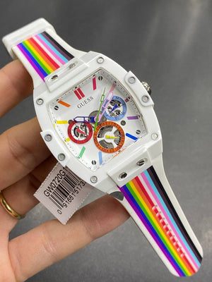 Real-life photo of Guess GW0720G1 showing the actual rainbow colors and white finish