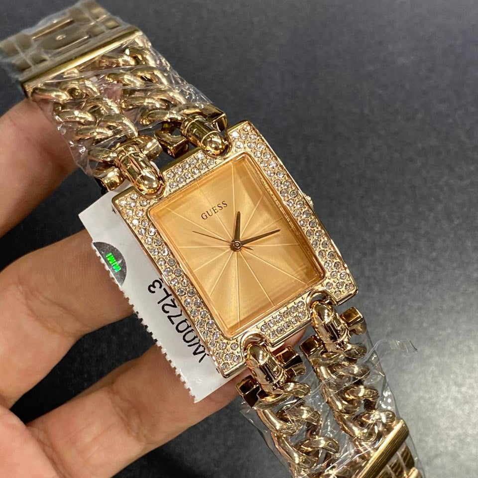 Authentic real-life photo of the Guess Mod Heavy Metal W0072L3 watch showing actual rose gold chain finish