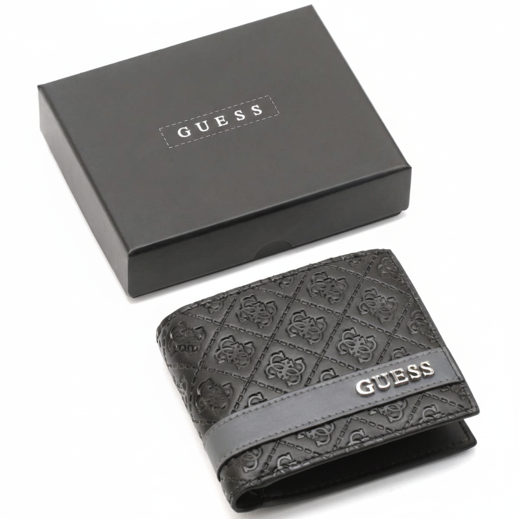A closed Guess men's black leather bifold wallet with an embossed logo pattern and silver lettering, placed next to its matching black closed gift box