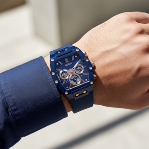 Man wearing Guess Phoenix GW0203G7 blue watch with a smart casual outfit