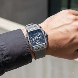 Man wearing Guess Phoenix GW0203G9 grey watch with a modern urban outfit