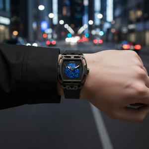 Male model wearing Guess Phoenix Lion Head GW0595G2 black watch with a modern industrial outfit