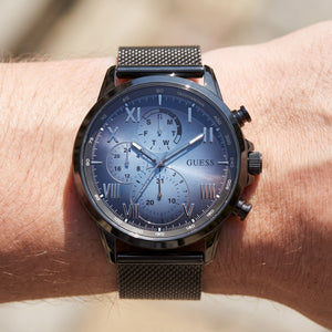 Wrist shot of Guess Porter W1310G3 watch showing the black metal band