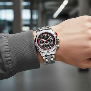 Male model wearing Guess Resistance GW0714G1 silver watch with a modern industrial outfit