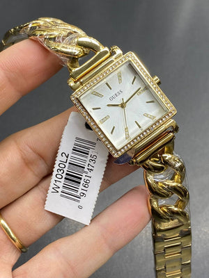 Authentic real-life photo of the Guess Vanity W1030L2 watch showing actual gold finish and square dial