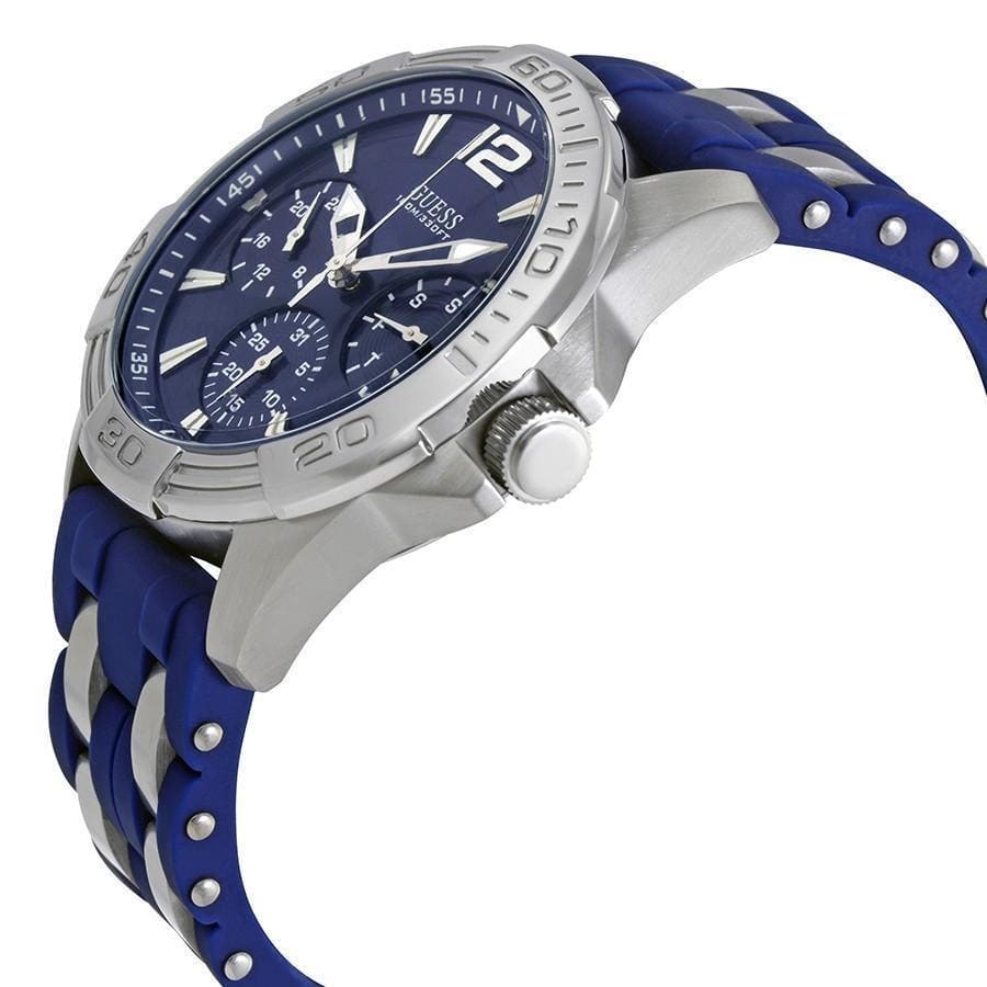 Left side perspective of the Guess W0366G2 highlighting the blue rubber strap with silver links