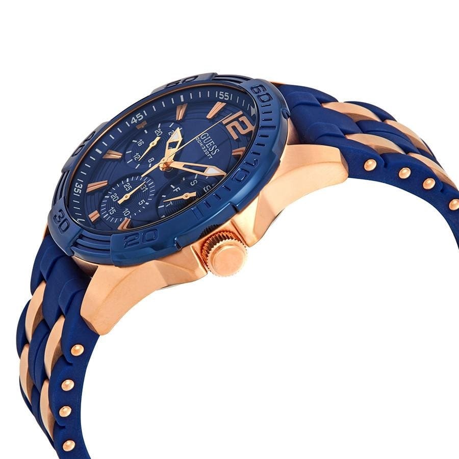 Angled view of Guess W0366G4 showing the blue sport bezel and rose gold lugs