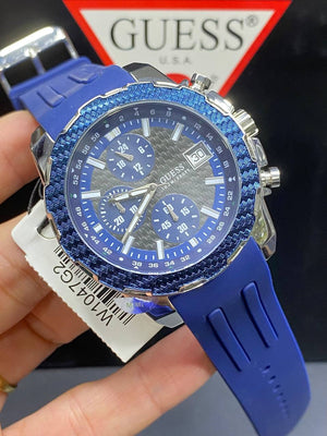 Authentic real-life photo of the Guess W1047G2 showing actual blue bezel texture and carbon look in Egypt