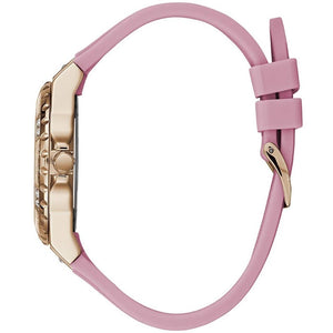 Angled view of Guess W1053L3 highlighting the polished rose gold-tone case and durable pink rubber strap