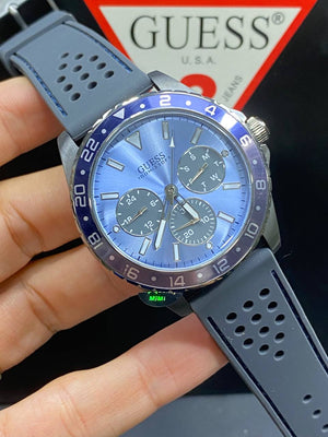 Authentic real-life photo of the Guess W1108G6 showing actual sky blue dial and grey strap in Egypt