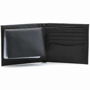 Fully open interior view of a Guess men's black leather wallet showcasing a flip-out ID window passcase on the left, and a snap-button coin pocket with debossed branding on the right