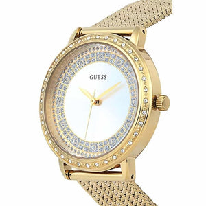 Angled view of the Guess W0836L3 highlighting the polished gold mesh strap and crystal accents