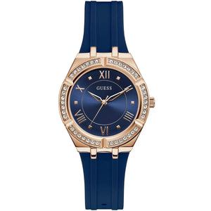 Guess Cosmo GW0034L4 women's quartz battery watch with blue sunray dial, gold-tone Roman numerals, gold case with crystals, blue rubber strap main view