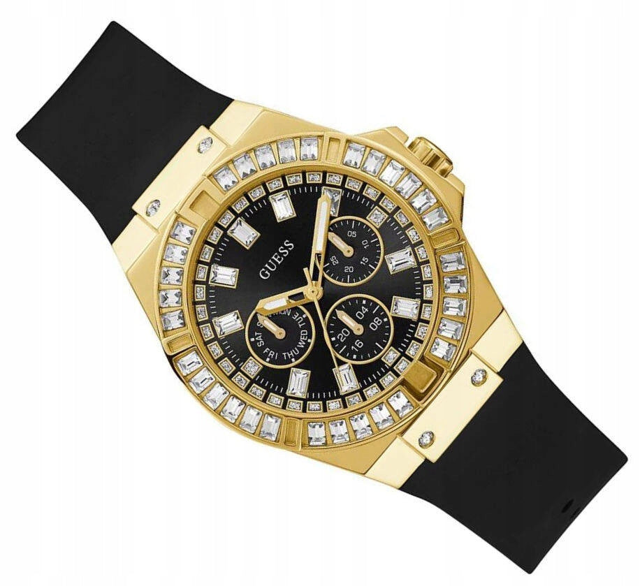 Left angled view of Guess Venus GW0118L1 women's quartz battery watch showing black rubber strap and gold-tone case profile