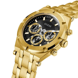 Gold watch with black face and visible brand name on a white background