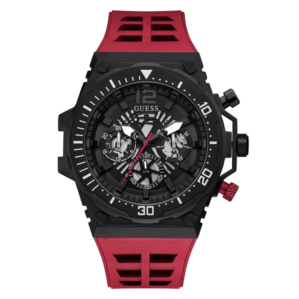 Guess Exposure GW0325G3 men's watch with black industrial case, skeleton dial, and red rubber strap