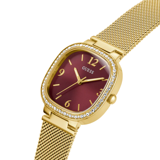Side profile of Guess Tapestry GW0354L4 women's quartz battery watch showing 8mm thickness and polished gold finish