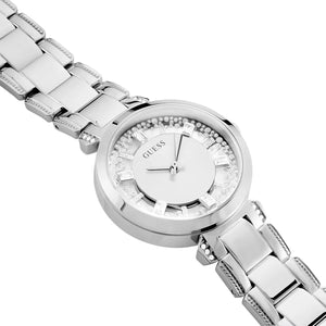Side profile of Guess Crystal Clear GW0470L1 women's quartz battery watch showing 9mm thickness and polished silver finish