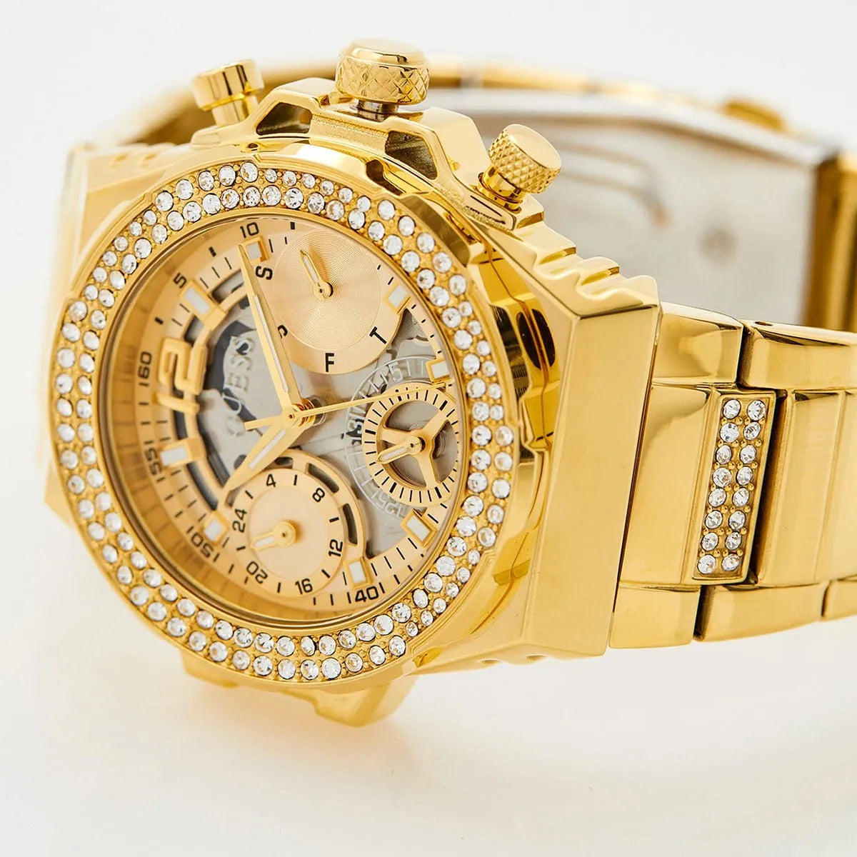Side profile of Guess Fusion GW0552L2 women's quartz battery watch showing 10.5mm thickness and gold finish