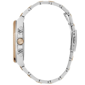 Close-up of a silver watch with a white background
