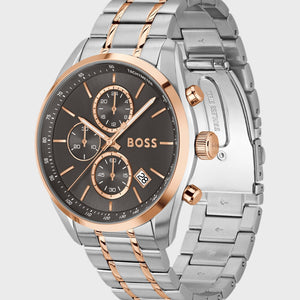 Detailed side view of the rose gold-tone crown and chronograph buttons on the Hugo Boss watch