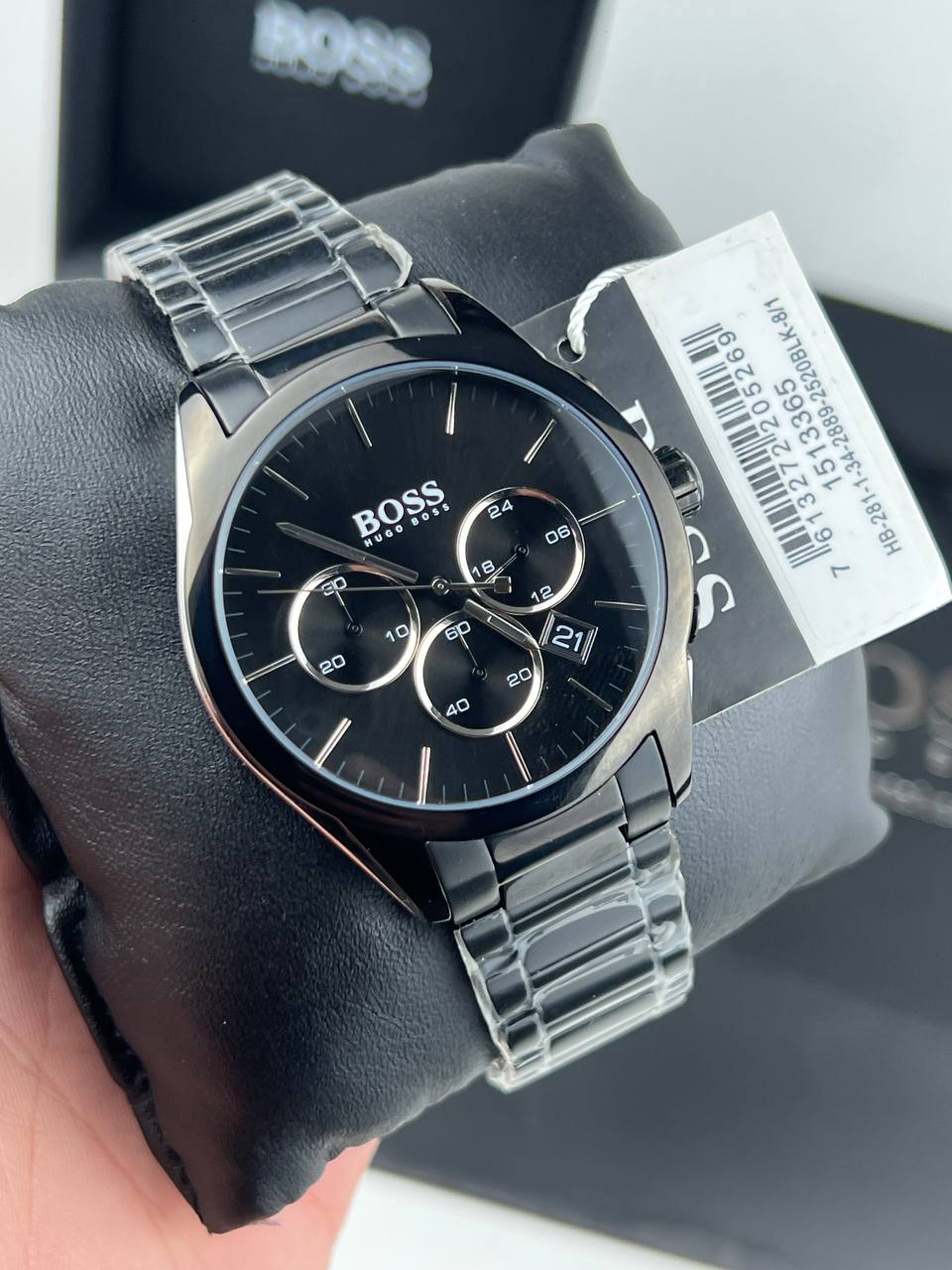 Authentic real-life photo of Hugo Boss 1513365 showing actual black IP shine and dial details