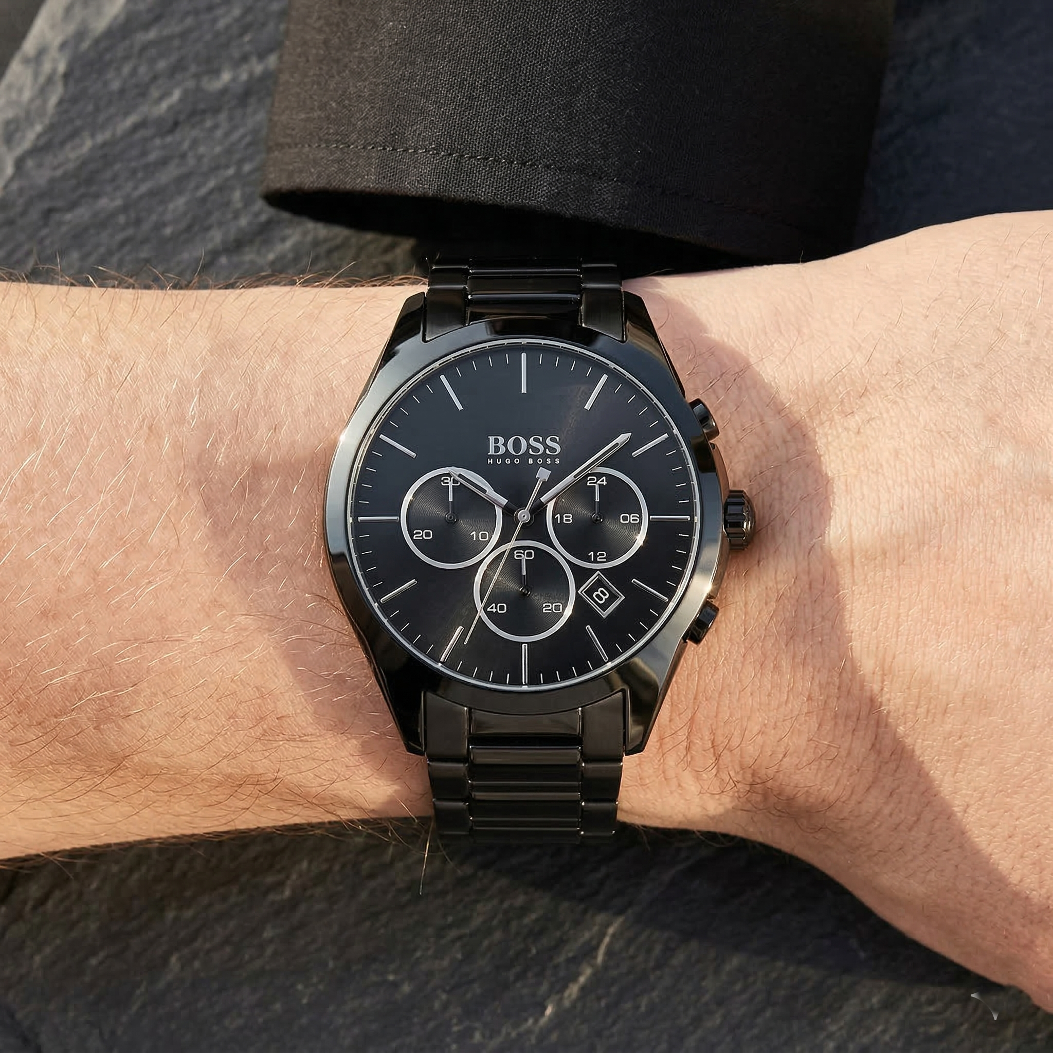 Close up shot of Hugo Boss 1513365 on wrist showing the black dial with chronograph sub-dials and silver-tone hands