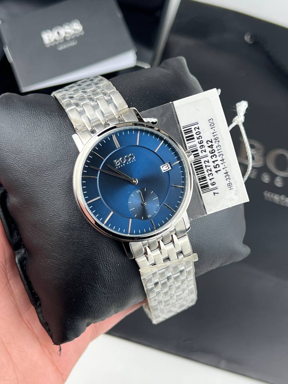 Authentic real-life photo of Hugo Boss 1513642 showing actual silver shine and blue dial details
