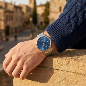 Close up shot of Hugo Boss 1513642 on wrist showing the blue sunray dial with date window and small seconds sub-dial