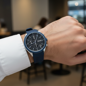 Detailed macro view of the black textured dial and sub-dials of Hugo Boss 1513717