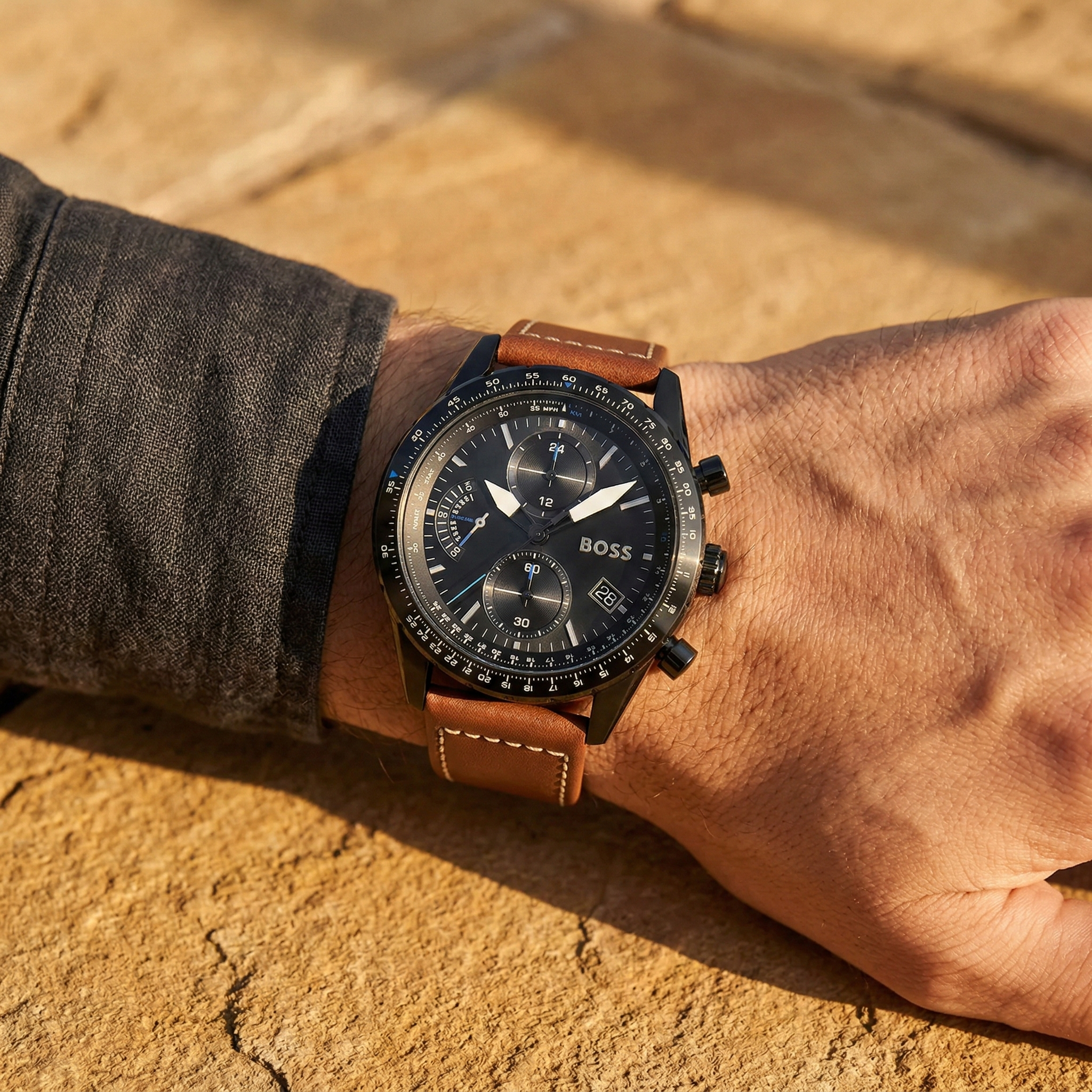 Close up shot of Hugo Boss Pilot Edition 1513851 on wrist showing the black dial and technical chronograph scales