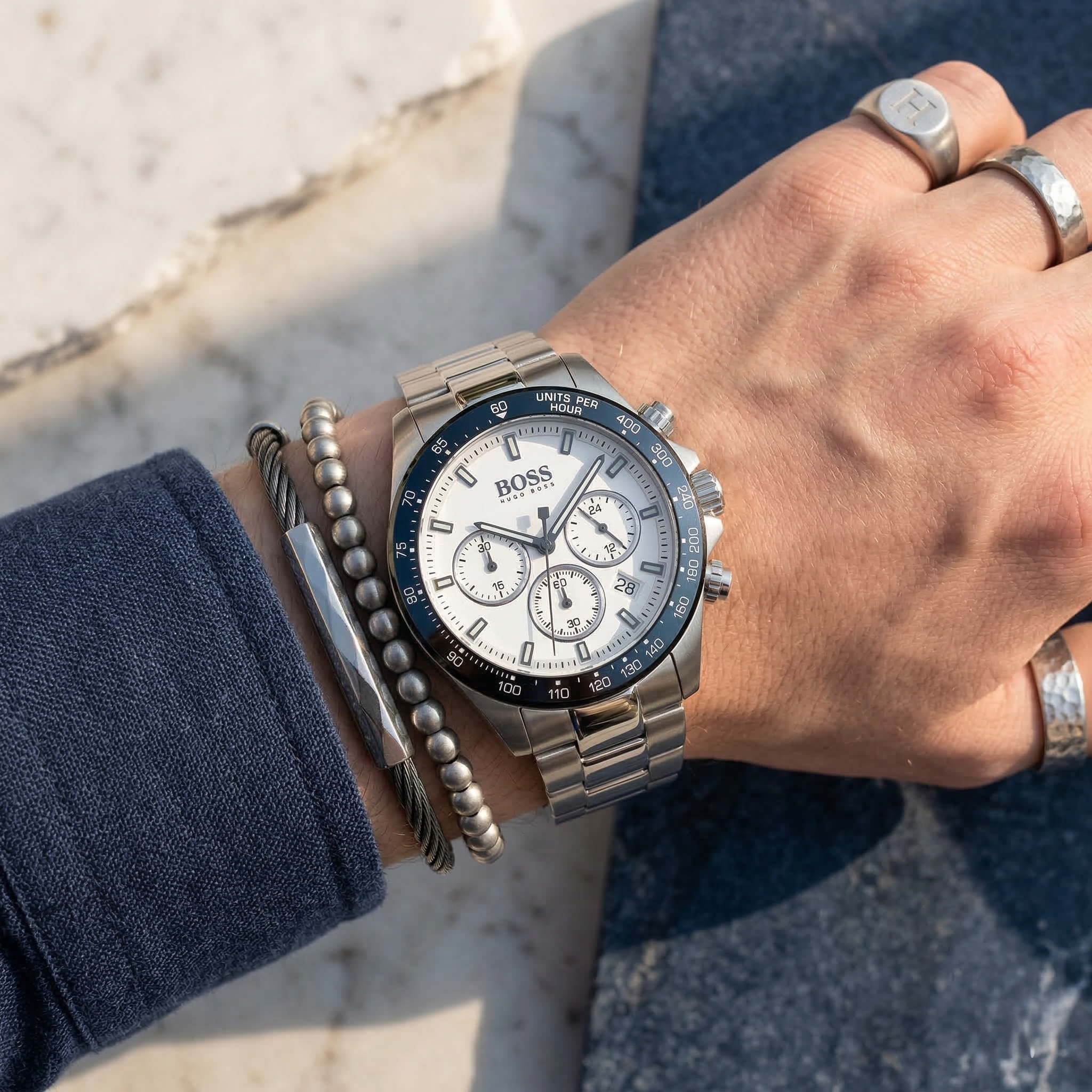 Close up shot of Hugo Boss 1513875 on wrist showing the crisp white dial and black tachymeter bezel
