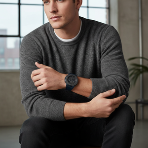 Male model wearing Hugo Boss Taper 1514086 blue watch with a rugged denim outfit