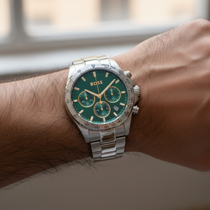 Detailed macro view of the green sunray dial and gold-tone hands of Hugo Boss 1514217