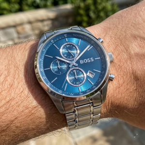 Close up shot of Hugo Boss Grand Prix 1514226 on wrist showing the vibrant blue dial and silver hands