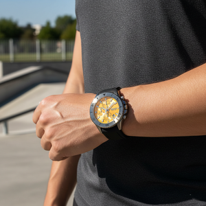 Male model wearing Hugo Boss Admiral 1513968 yellow watch with a sporty black outfit