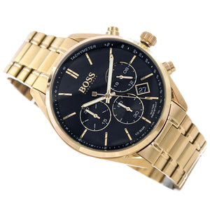 Detailed side view of the gold crown and buttons on the Hugo Boss 1513848