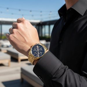 Male model wearing Hugo Boss Champion 1513848 gold watch with a formal black suit