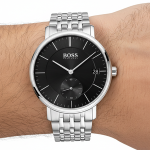 Close up shot of Hugo Boss Corporal 1513641 watch on wrist showing the date window and silver indices