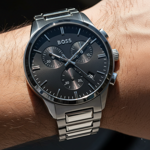 Close up shot of Hugo Boss Dapper 1513929 watch on wrist showing the matte black dial and grey hands