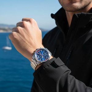 Male model wearing Hugo Boss Globetrotter 1513823 silver watch with a sporty outfit