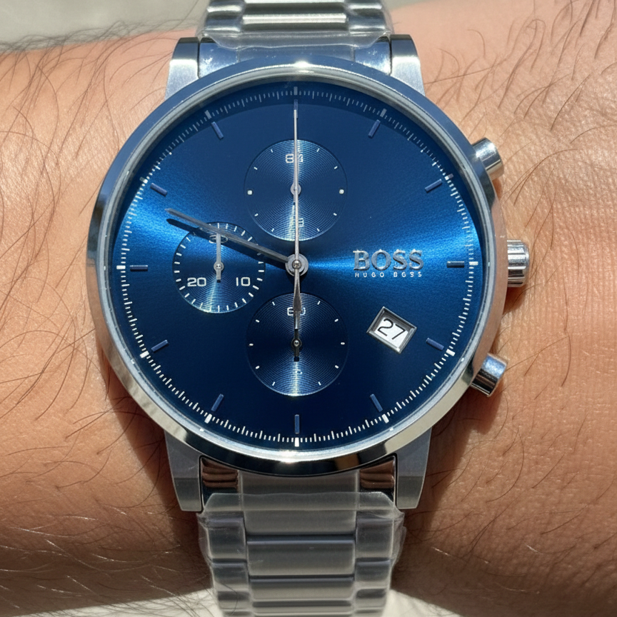 Close up shot of Hugo Boss Integrity 1513779 watch on wrist showing the blue sunray dial and silver indices