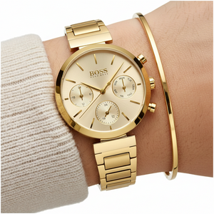 Close up of radiant gold sunray dial and markers of Hugo Boss 1502532