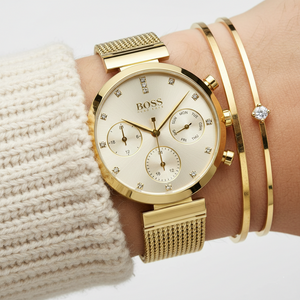 Close up of gold dial and sparkling crystal markers of Hugo Boss 1502552