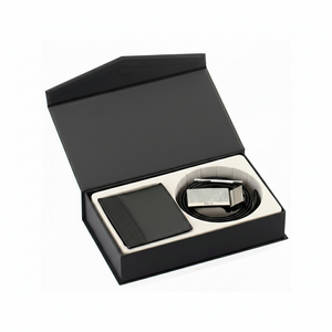 Hugo Boss men's gift set in a premium black magnetic box featuring a bicolor leather wallet and a matching belt with a textured metal buckle