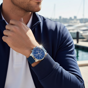 Male model wearing Hugo Boss Navigator 1513526 silver watch with a casual sporty outfit