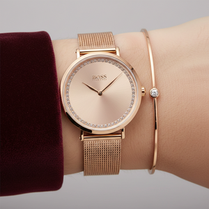 Close up of rose gold sunray dial and outer sparkling crystal ring of Hugo Boss 1502548