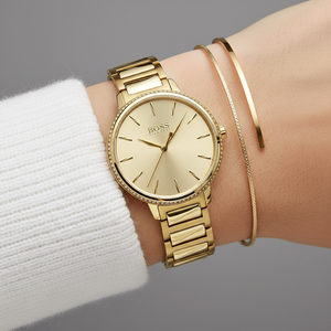 Close up of gold dial and sparkling crystal bezel of Hugo Boss 1502541