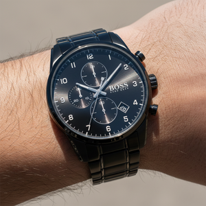 Close up shot of Hugo Boss Skymaster 1513785 watch on wrist showing the black dial and aviation details